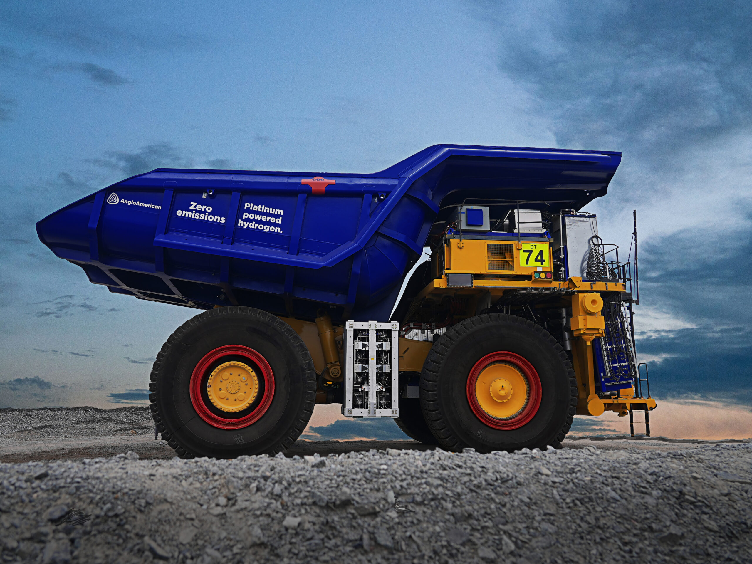 An ultra-class haul truck that's three-stories tall retrofitted with a diesel-free engine by First Mode.